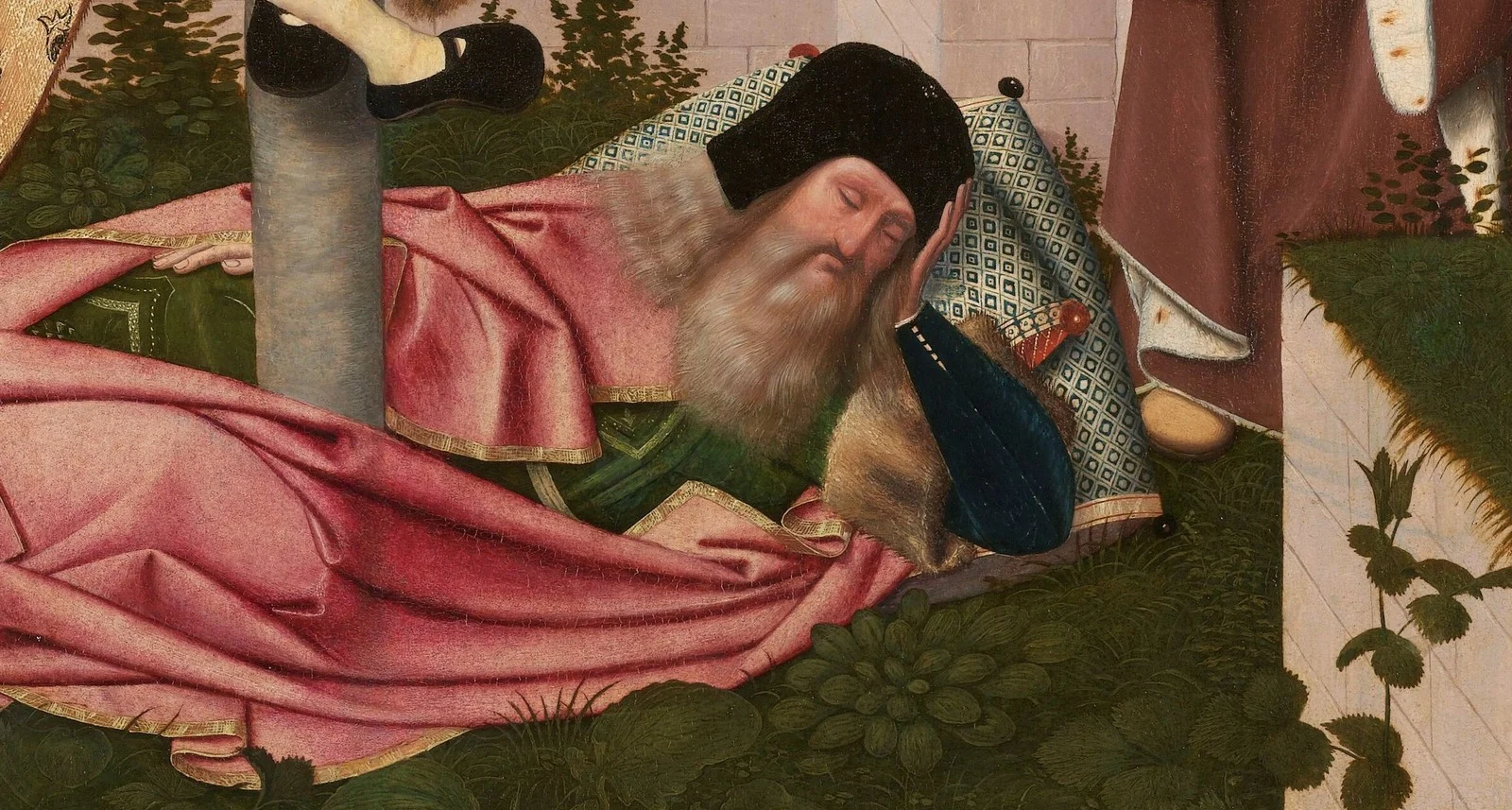 Jesse sleeps on the grass. The trunk rises from his body.