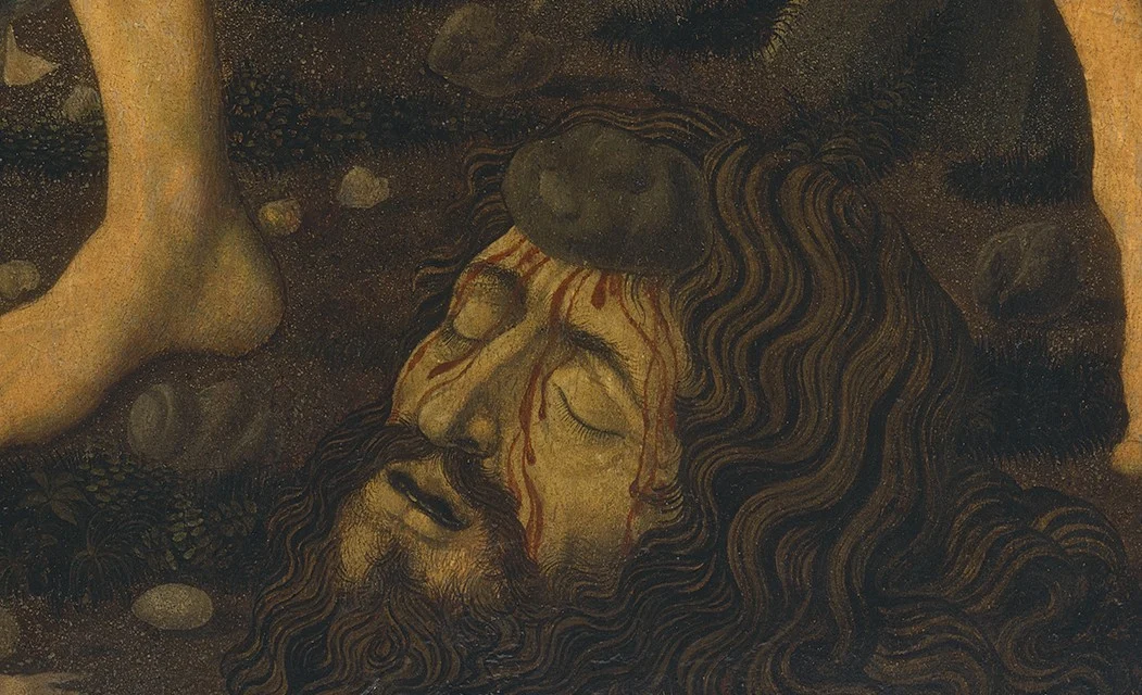 The stone is still lodged in Goliath's forehead.