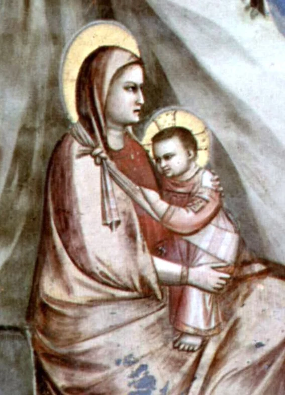 Mother and child look straight ahead, in the direction of the journey.
