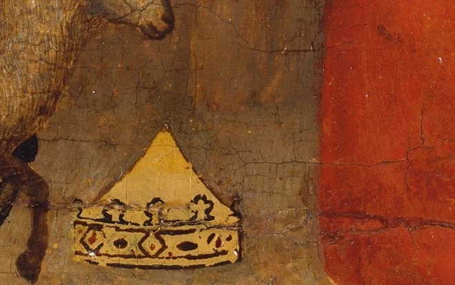 His crown lies on the bare ground.