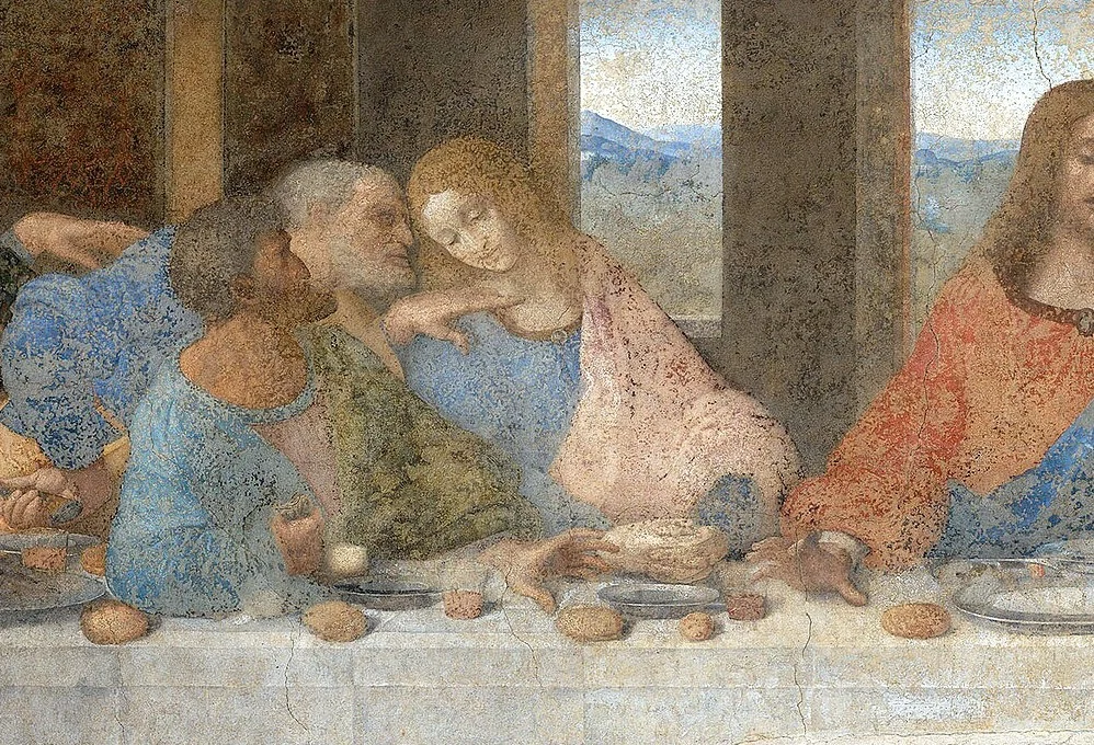 Judas recoils and clutches the purse; his is the only face in shadow. Behind him Peter leans across to John, a knife in his hand.