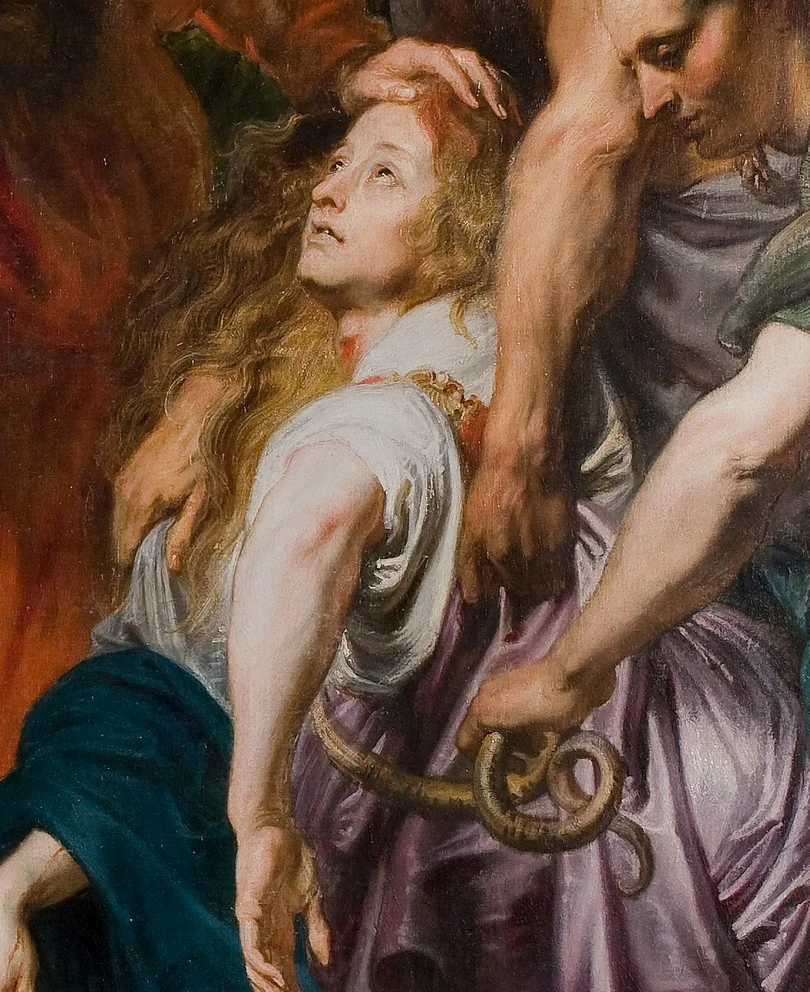 A woman who has been bitten is turned towards the pole by the people around her. Looking is all that is asked of her.