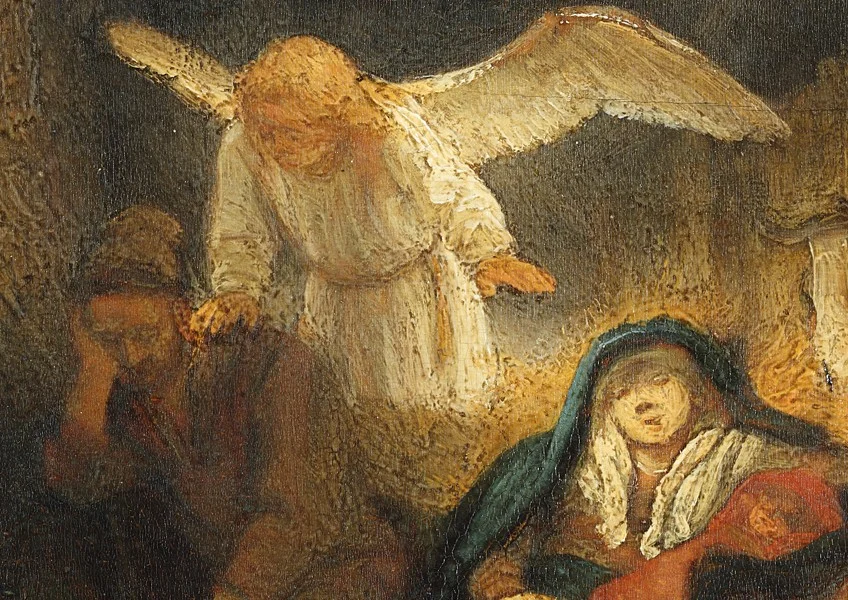 All the light in the stable comes from the angel.