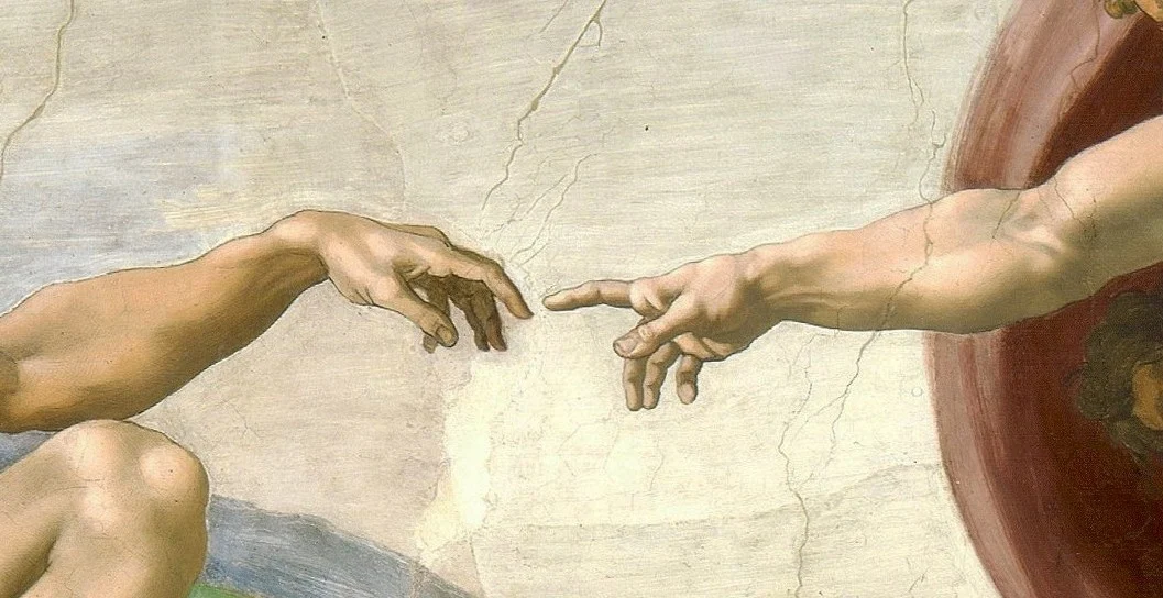 God's finger is stretched out, Adam's still hangs. Between them: a few centimetres of empty sky.