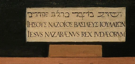 The inscription is written out in Hebrew, Greek and Latin, as John's Gospel reports it: Jesus of Nazareth, the King of the Jews.