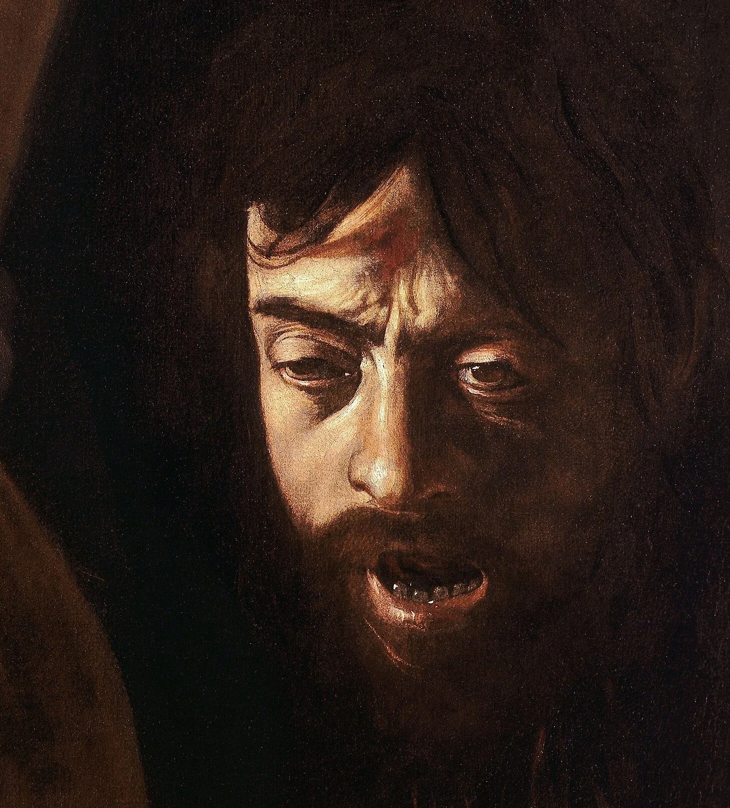 The face of Goliath: the eyes not yet quite dead, the mouth open.