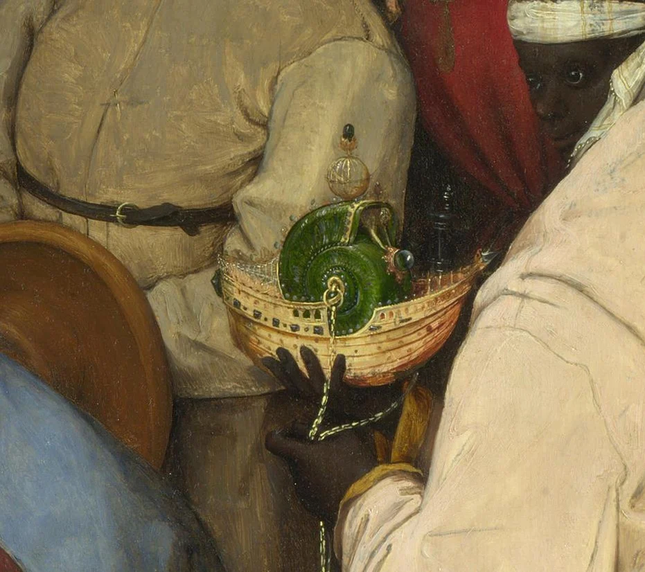 The third king's gift: a small golden ship that carries a shell.