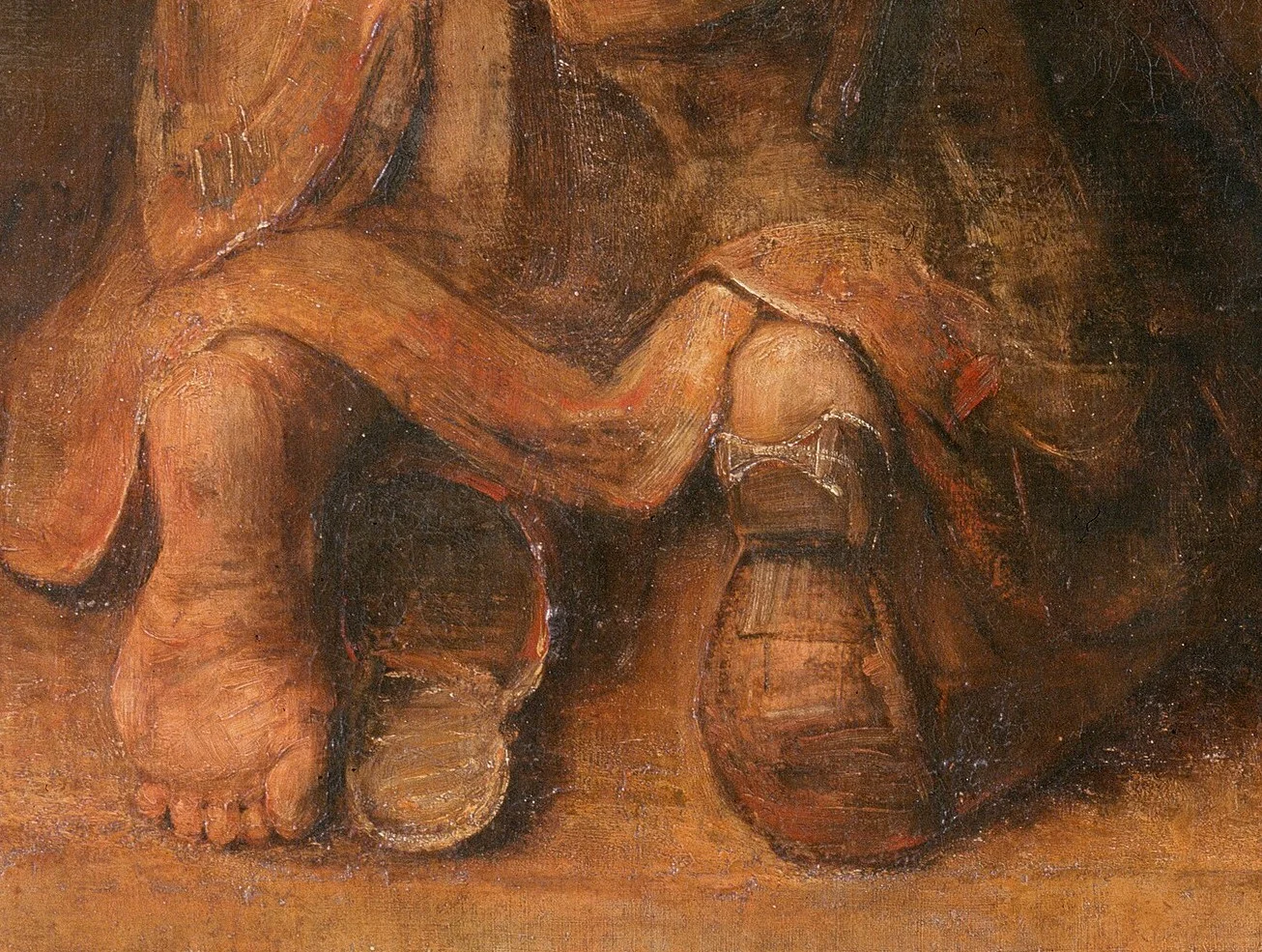 One shoe has fallen off, the other is worn through. This is how far he has walked.